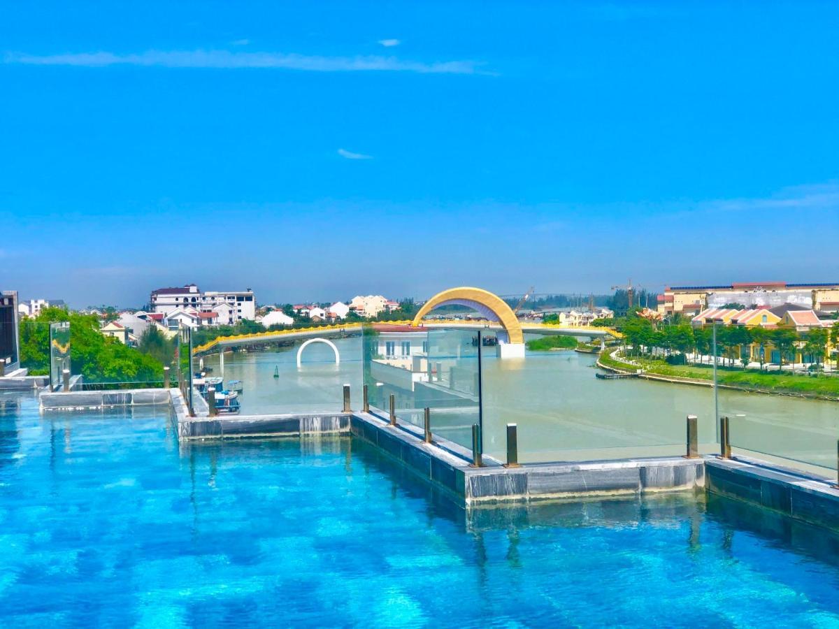 Little Riverside Hoi An . A Luxury Hotel & Spa Exteriör bild View of the bridge from the rooftop pool of the hotel